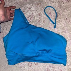 ATHELTA long line one shoulder turquoise sports bra!